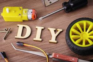 DIY spelled in wooden letters on the table