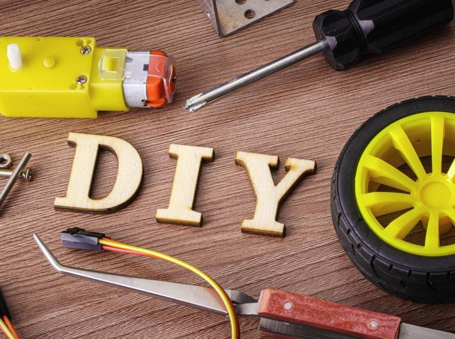 DIY spelled in wooden letters on the table