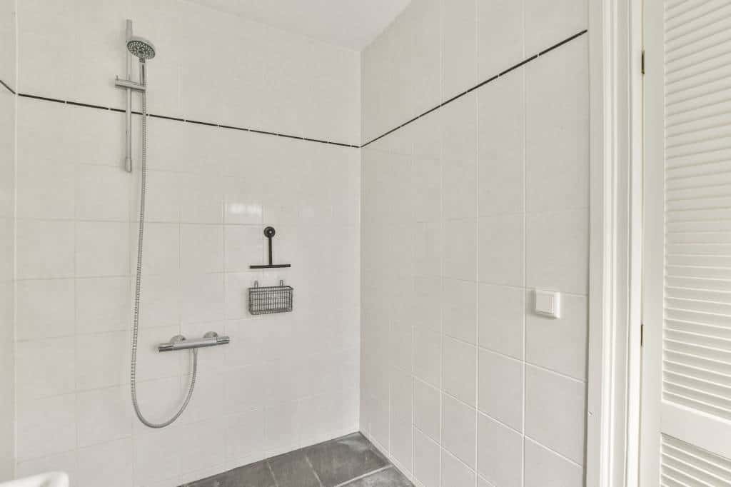 Spacious bathroom with white shower